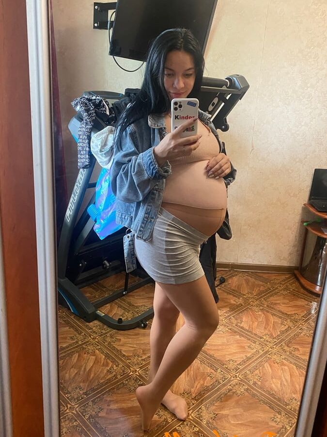 Pregnant Brunette In Sheer Pantyhose