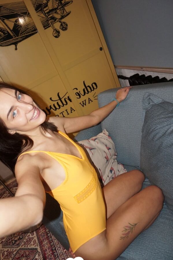 Hot brunette displaying all of her curves