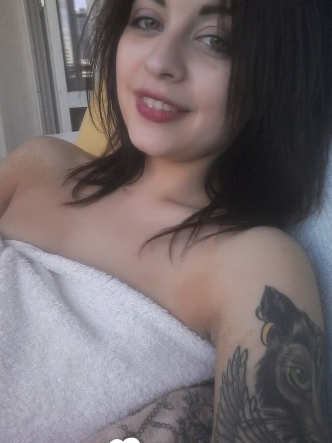 Tattooed beauty strips and shows off everything