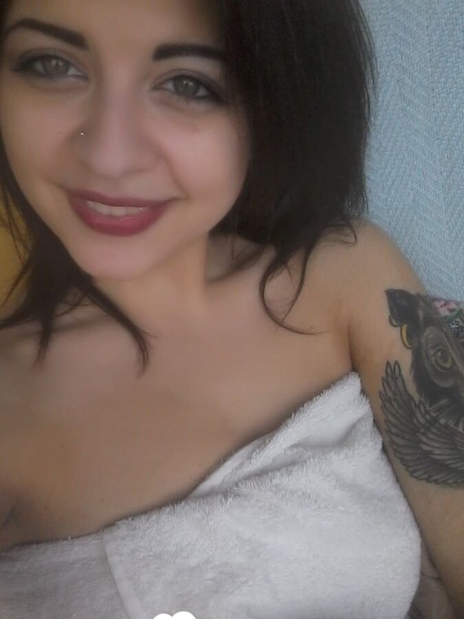 Tattooed beauty strips and shows off everything