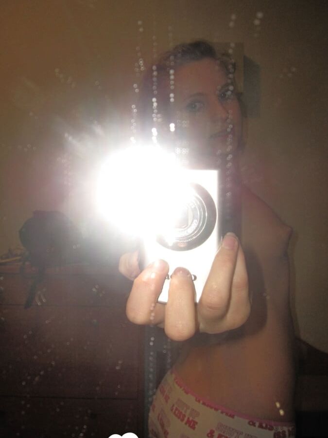 Cute neighbor takes a couple of nude selfies
