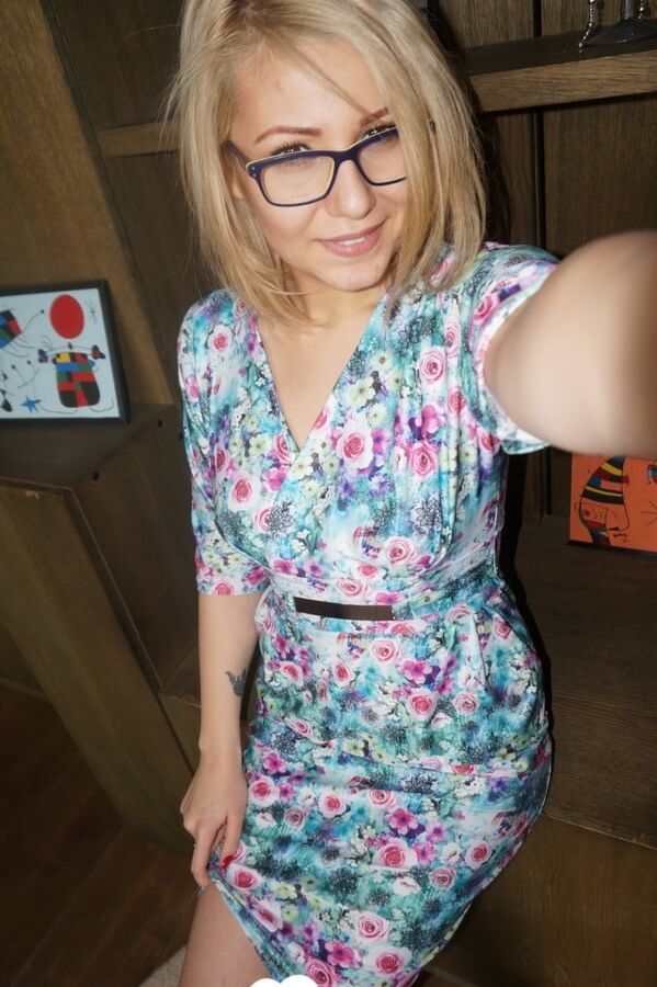 Amateur blonde with glasses exposes her naughty side
