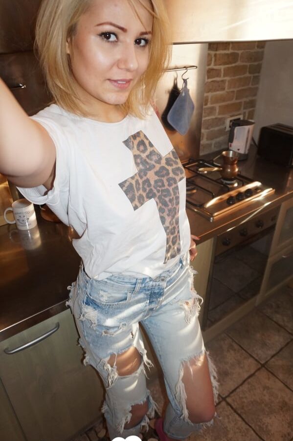 Amateur blonde with glasses exposes her naughty side