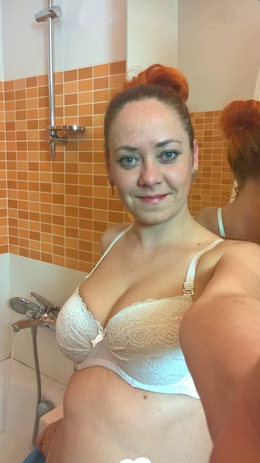 Hot MILF whips out her tits while masturbating