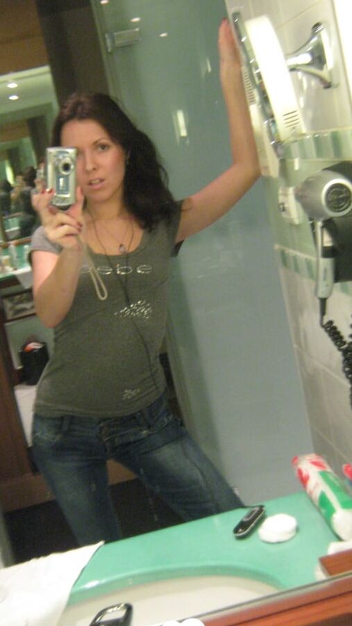 Innocent brunette teasing in her own bathroom