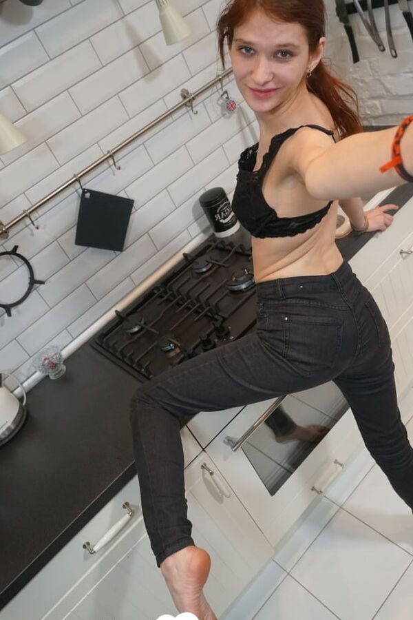 Cute teen poses naked while on camera