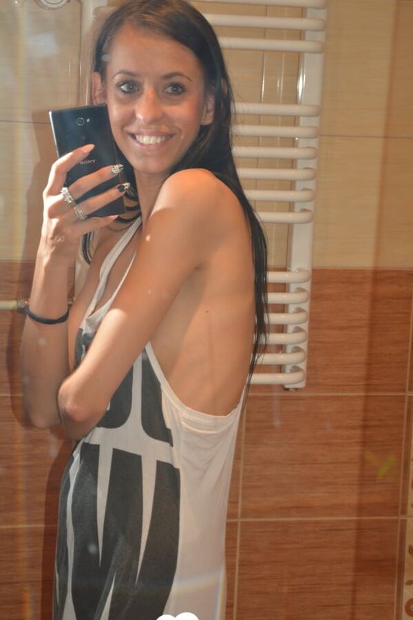 Skinny babe teases with her small tits