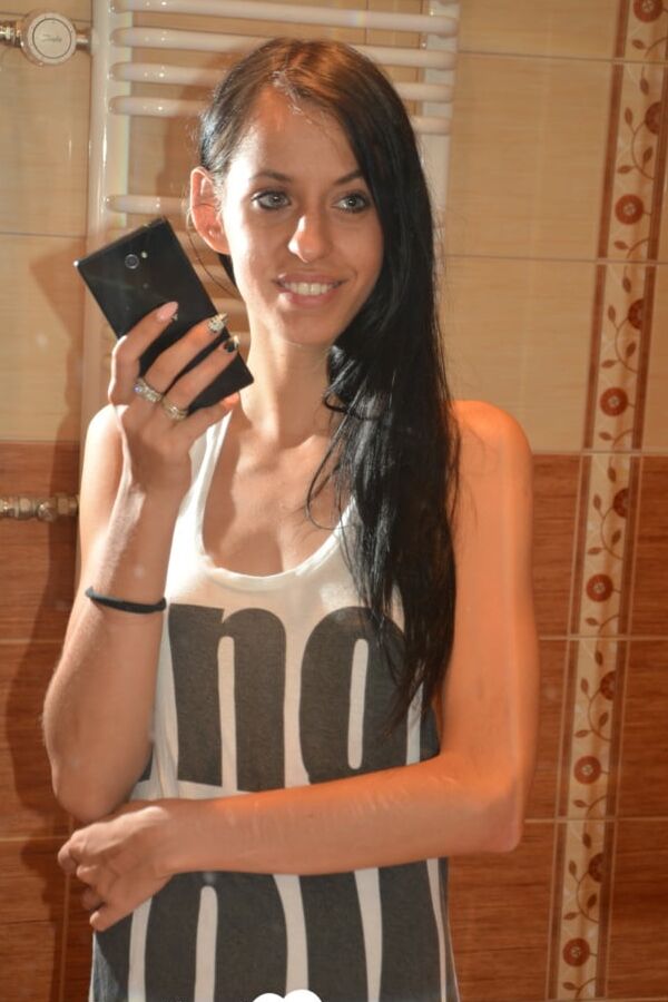 Skinny babe teases with her small tits