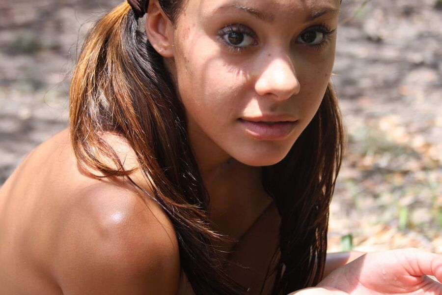 Cute tanned latina Gabrielle loves posing nude outdoors