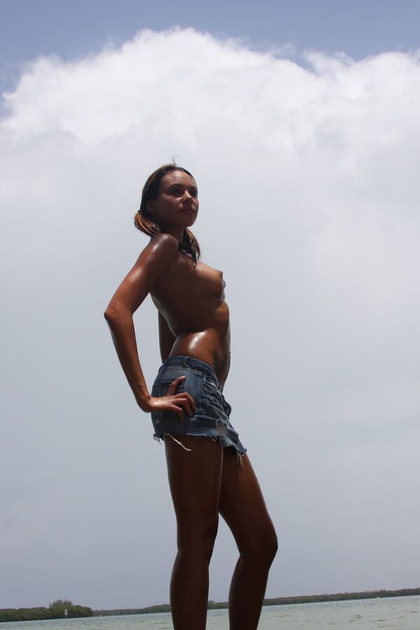 Cute tanned latina Gabrielle loves posing nude outdoors