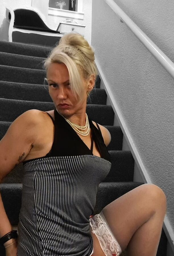 Sexy blonde in secretary outfits, officially out of hour vie