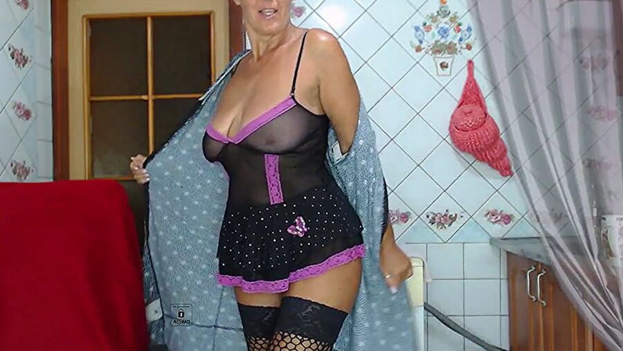 Lukerya in black fishnet stockings
