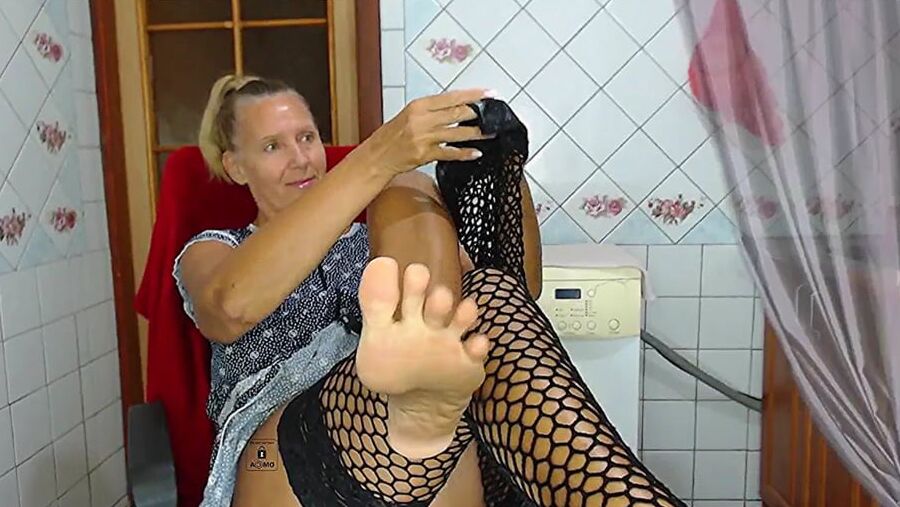 Lukerya in black fishnet stockings