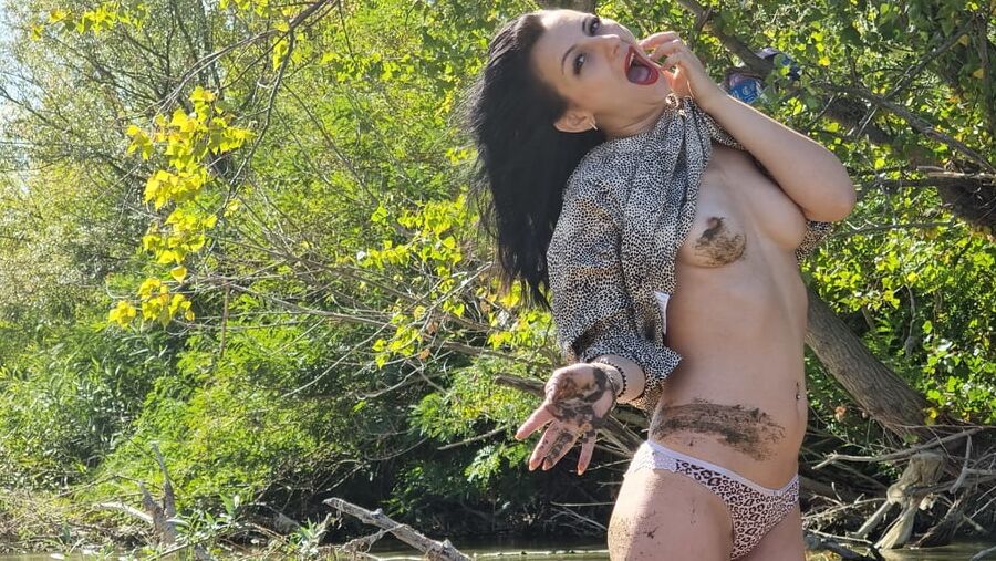 Naked in the mud