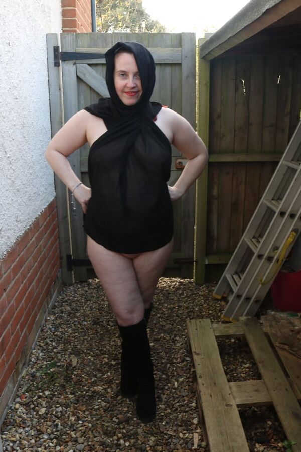 Hijab and Boots in the Yard