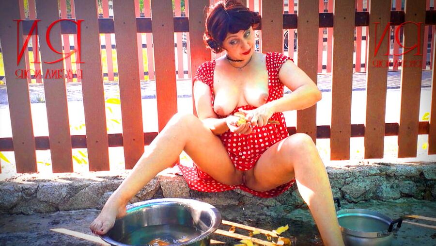 Retro maid prepares potatoes for dinner. Vintage performance