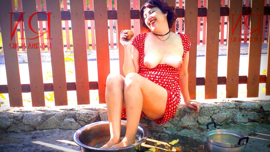Retro maid prepares potatoes for dinner. Vintage performance