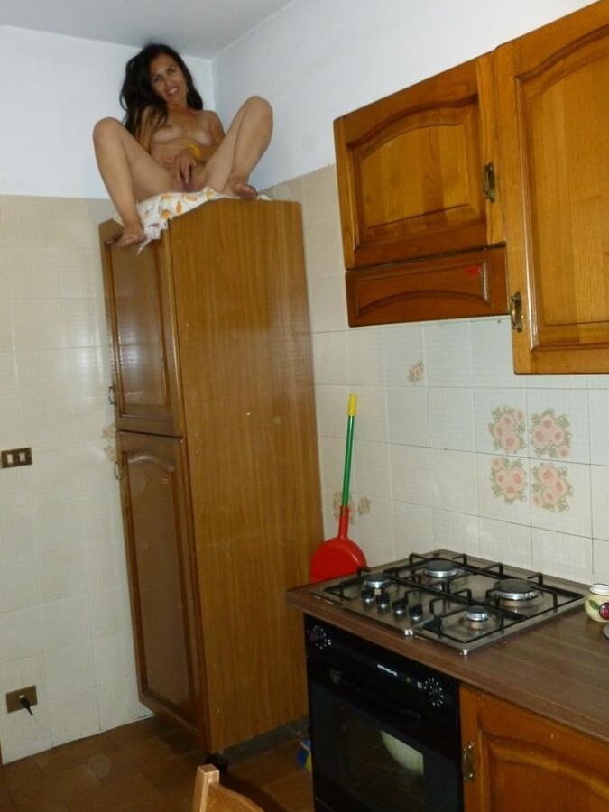Hot Italian Mature Solo Masturbation In The Kitchen