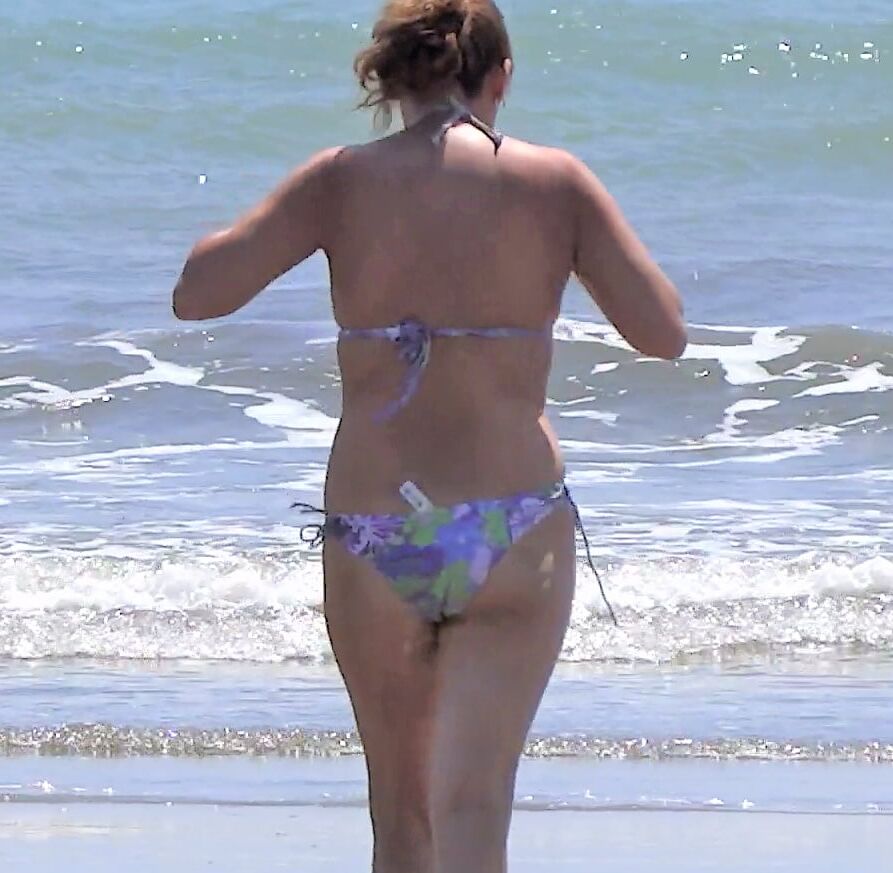My hairy wife on the beach, watch her videos too