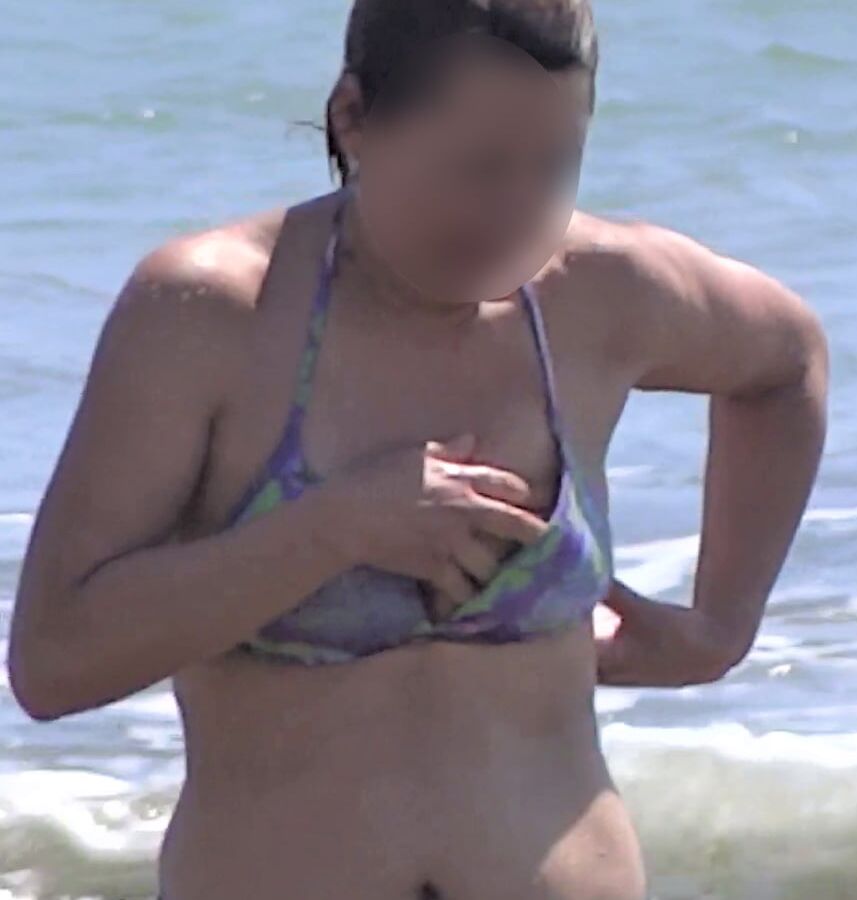 My hairy wife on the beach, watch her videos too