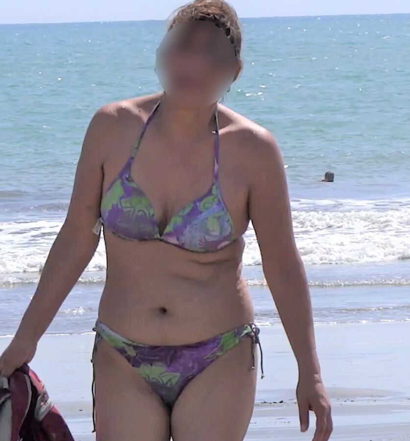 My hairy wife on the beach, watch her videos too