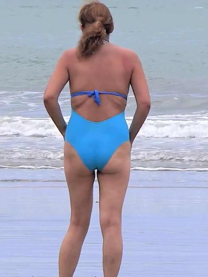 My hairy wife on the beach, watch her videos too