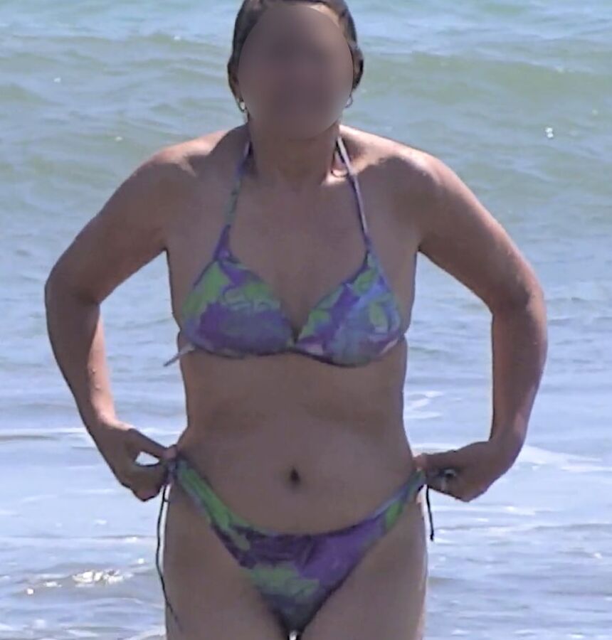 My hairy wife on the beach, watch her videos too