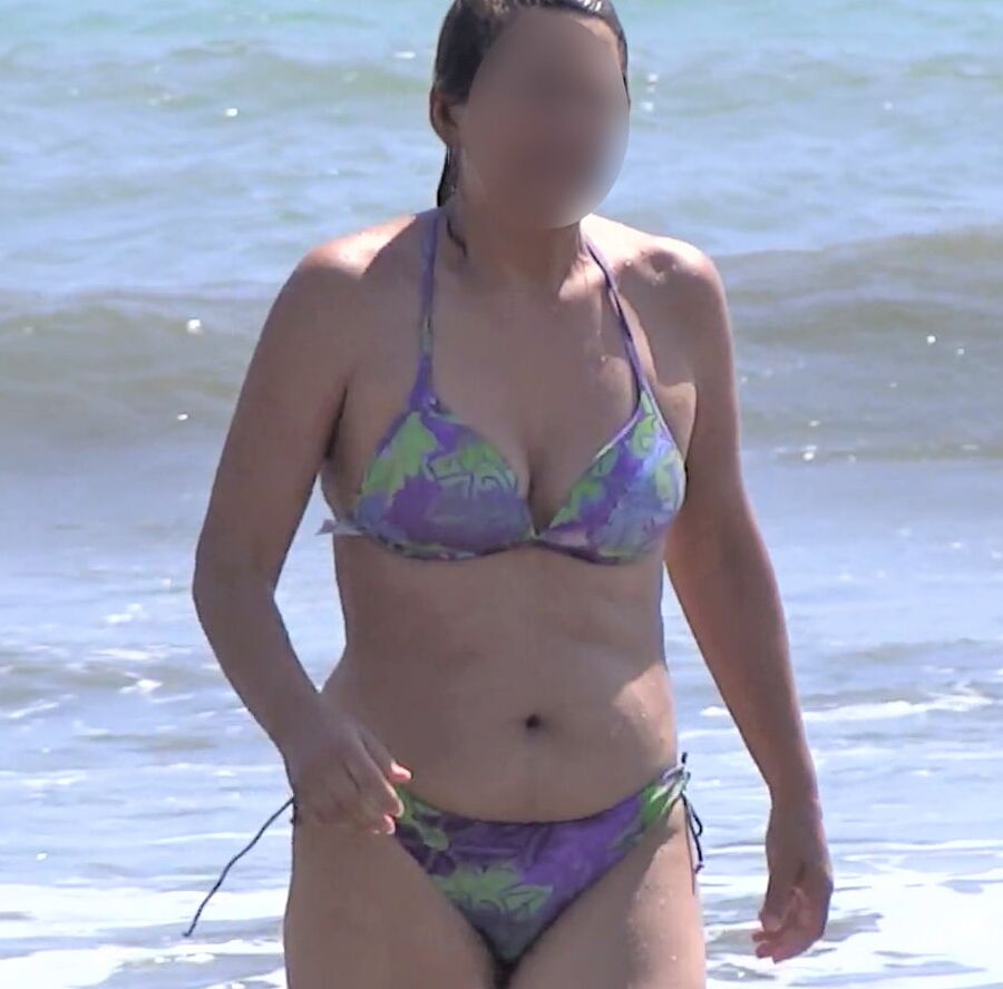 My hairy wife on the beach, watch her videos too