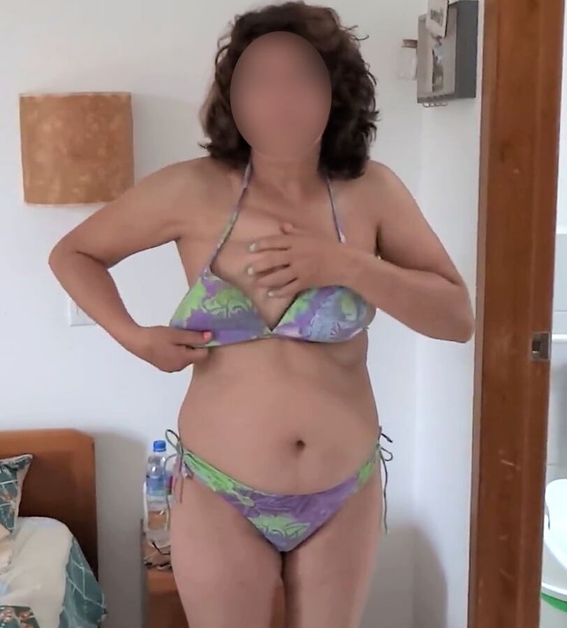 My hairy wife on the beach, watch her videos too