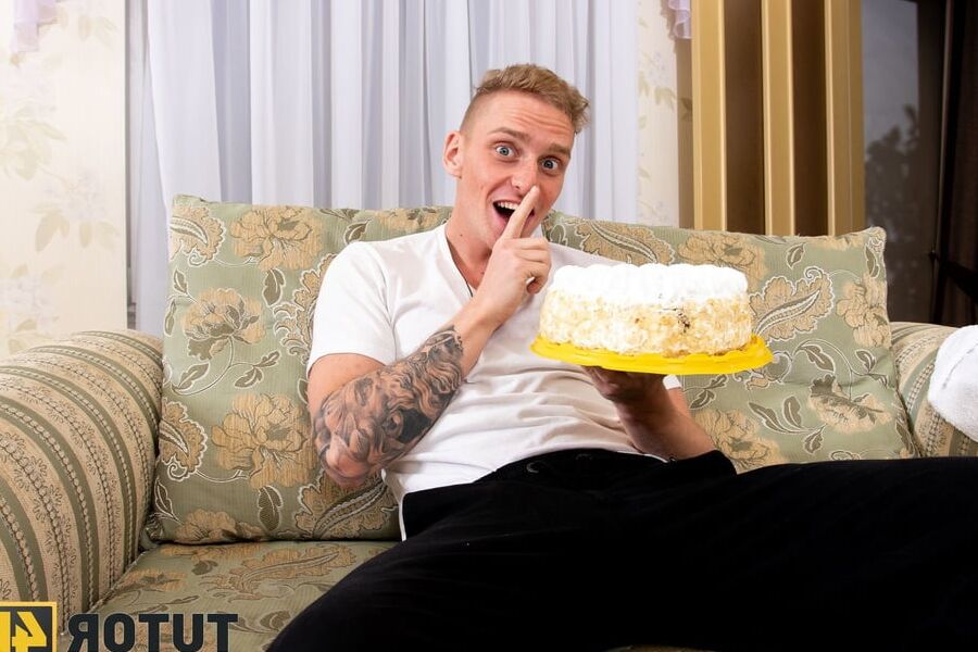 A cake with whipped cream and a huge cock