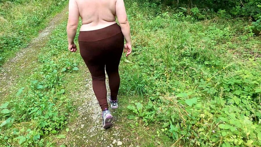 Topless hiking and slapping tits
