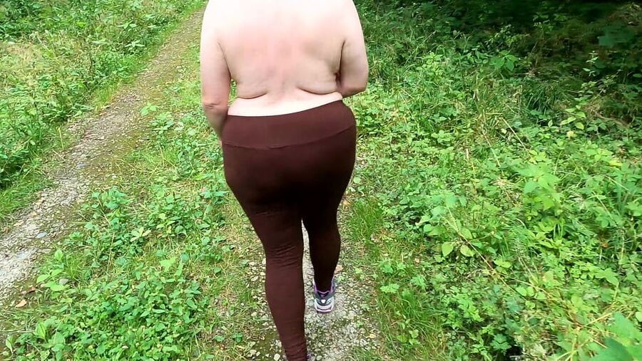 Topless hiking and slapping tits