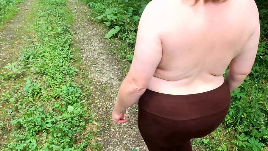 Topless hiking and slapping tits