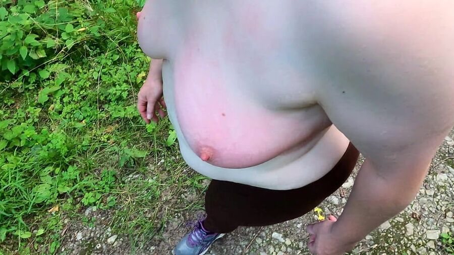 Topless hiking and slapping tits