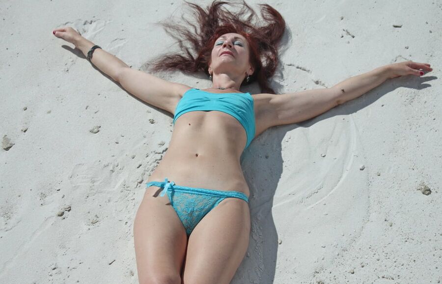 On White Sand in turquos bikini