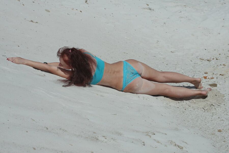 On White Sand in turquos bikini