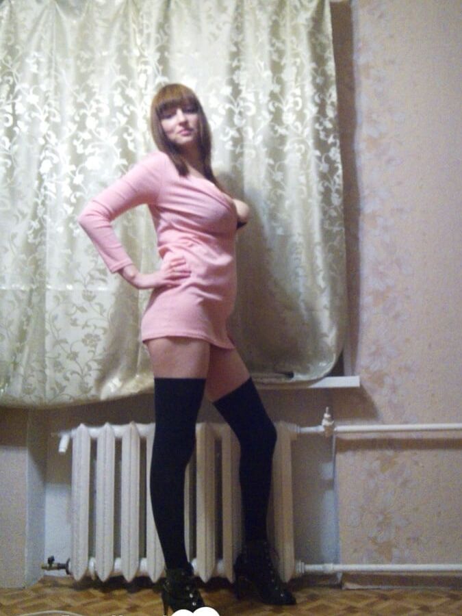 Beautiful teacher in stockings whips out her tits