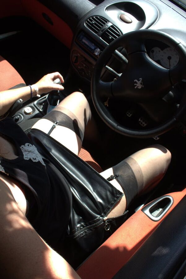 Caro with a leather skirt in our car