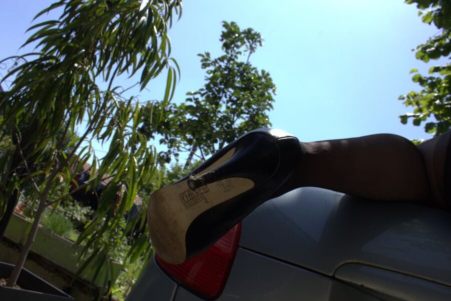 Caro with a leather skirt in our car