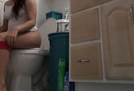 Teen on toilet