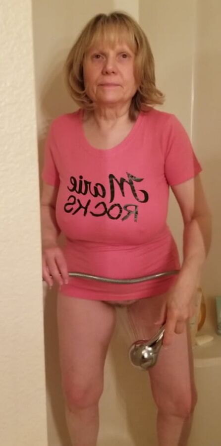 Hot grandmother sprays her pussy and cums in a wet t-shirt