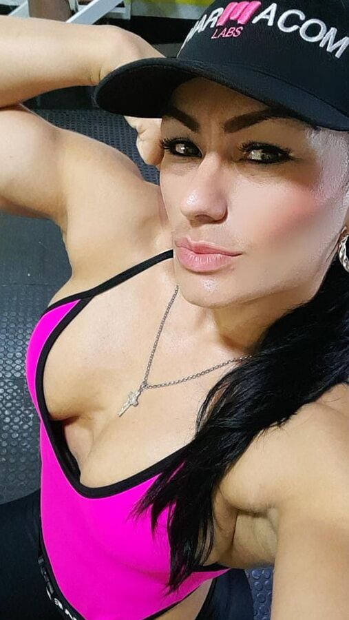 Muscular MILF in Pink