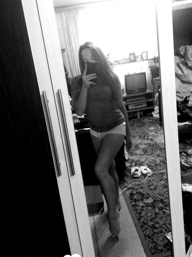 Hot girlfriend displaying her legs and ass