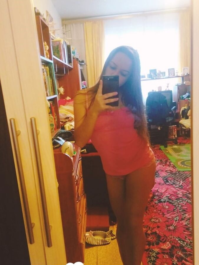 Hot girlfriend displaying her legs and ass