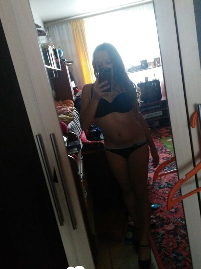 Hot girlfriend displaying her legs and ass