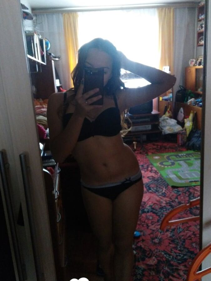Hot girlfriend displaying her legs and ass