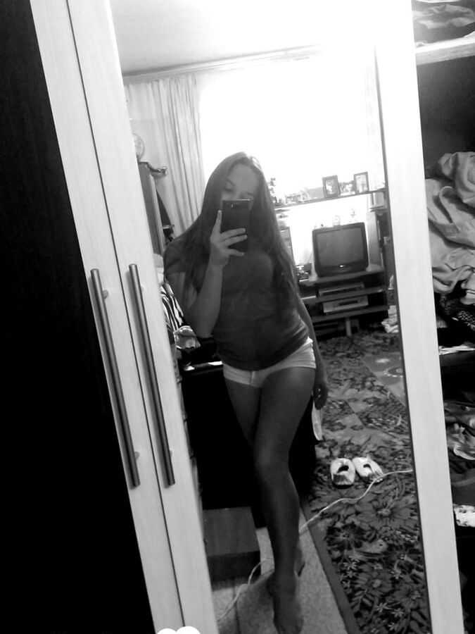 Hot girlfriend displaying her legs and ass