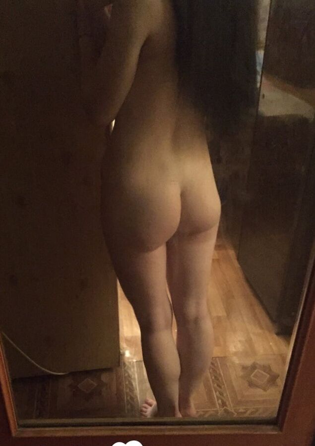 Checking out my new tattoo while naked