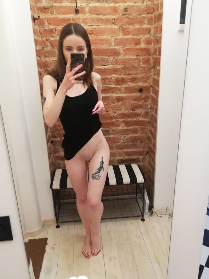 Checking out my new tattoo while naked