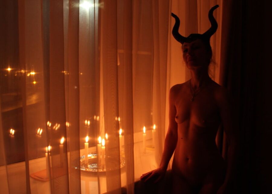 Naked Maleficent with Candles